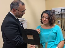 Dr. Champaneria with patient Dr. Champaneria with patient